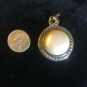 Silver reversible pendant with faux pearl stone